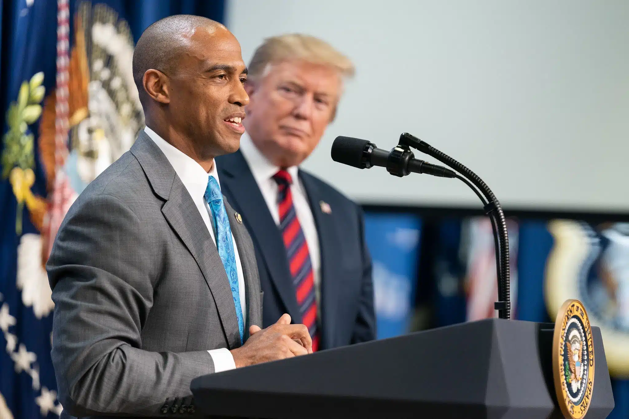 President Trump listens as Scott Turner, executive director of the White House Opportunity and Revitalization Council, speaks at the Opportunity Zone Conference on April 17, 2019. (Official White House Photo by Shealah Craighead)